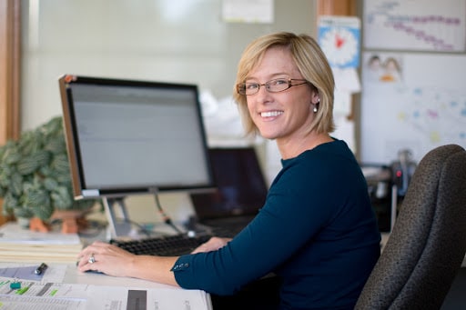 Woman working in front of her computer